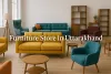 Colorful modern furniture in a stylish Uttarakhand store with vibrant sofas, chairs, and wooden shelves in natural lighting.