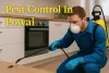 Pest control technician spraying cockroach in Powai kitchen with bold highlighted text and yellow sprayer.
